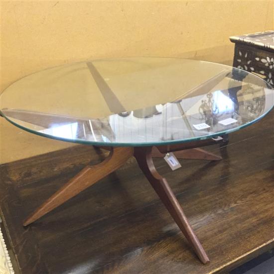 Danish teak coffee table by Vladimir Kagan for Sika Møbler, with cross-frame supports & circular glass top (bears label)